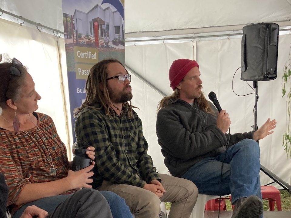 panelists on stage talking plans and permits at off grid festival 2023